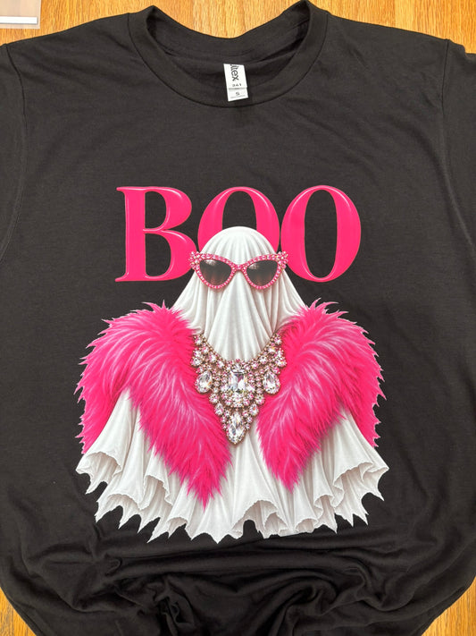 Boo Ghost wearing pink boa on black shirt